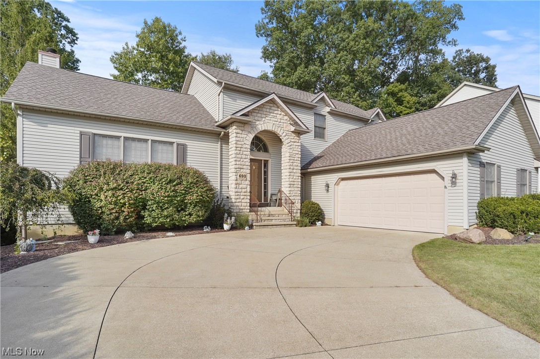 693 Timbercreek Road Northfield, OH 44067 - Photo 1 of 34 View of property with garage
