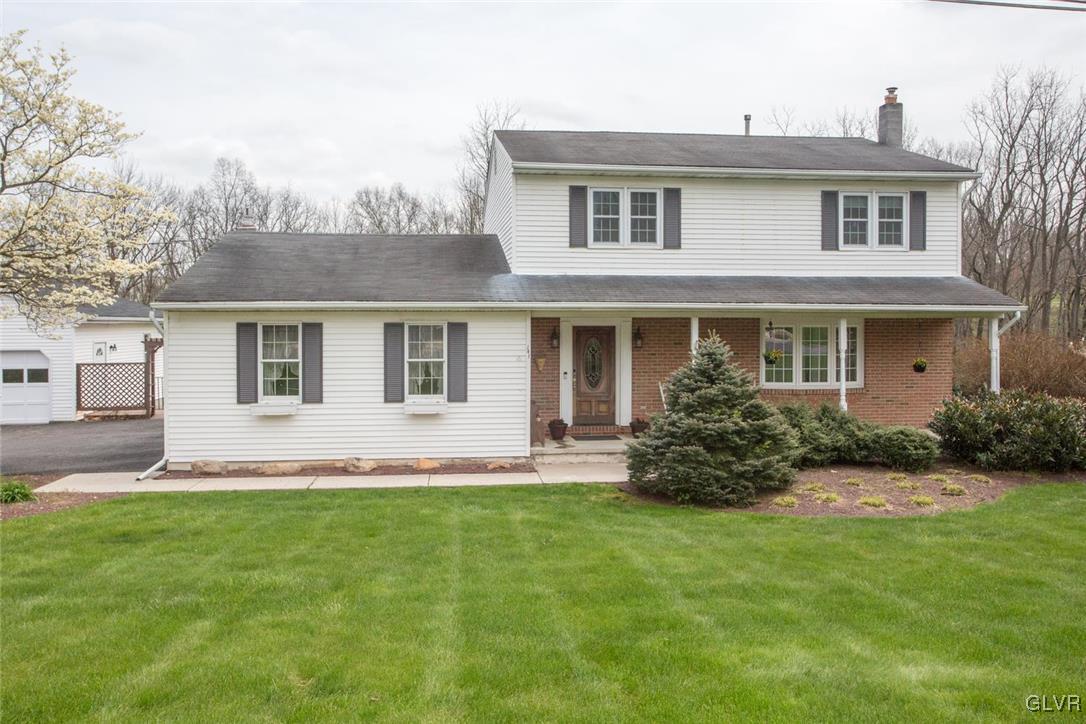 141 West Aluta Mill Road Nazareth, PA 18064 - Photo 1 of 32 a front view of house with yard and green space