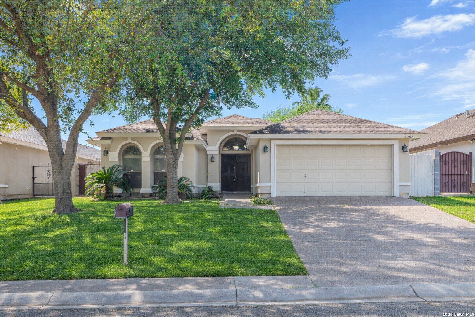 8710 Allegheny Laredo, TX 78045 - Photo 1 of 23 a front view of a house with a garden