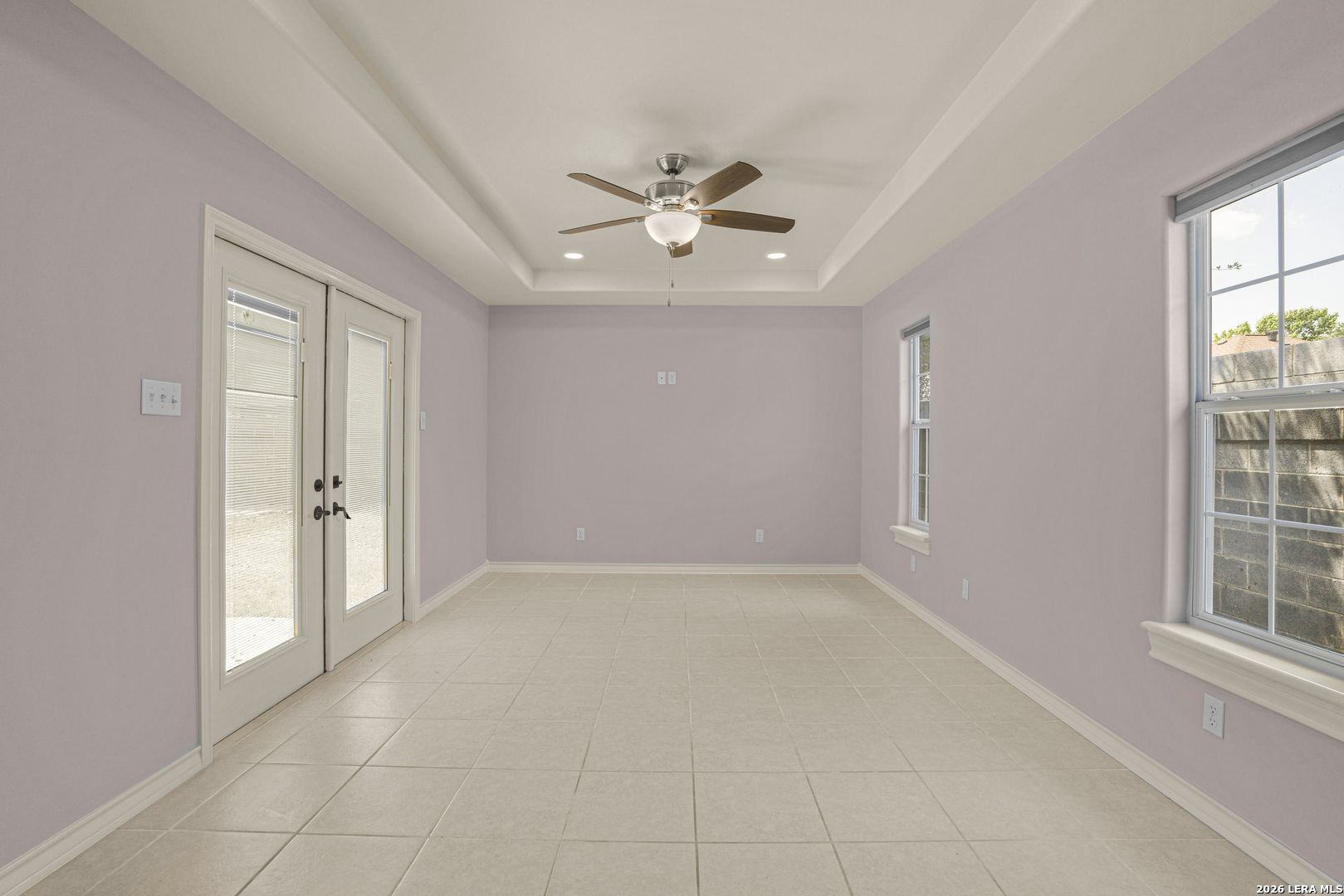 8710 Allegheny Laredo, TX 78045 - Photo 12 of 23 an empty room with windows and ceiling fan