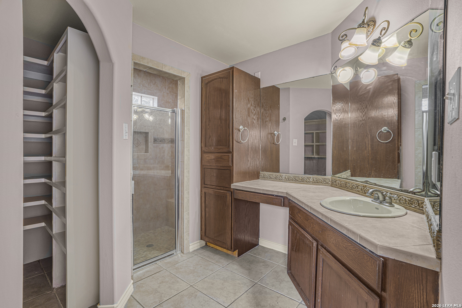 8710 Allegheny Laredo, TX 78045 - Photo 16 of 23 a bathroom with a sink double vanity and a mirror