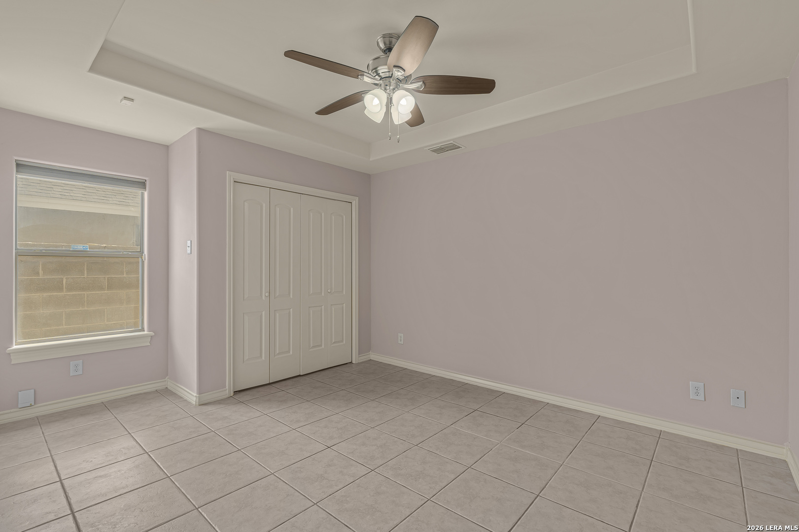 8710 Allegheny Laredo, TX 78045 - Photo 7 of 23 an empty room with windows and fan