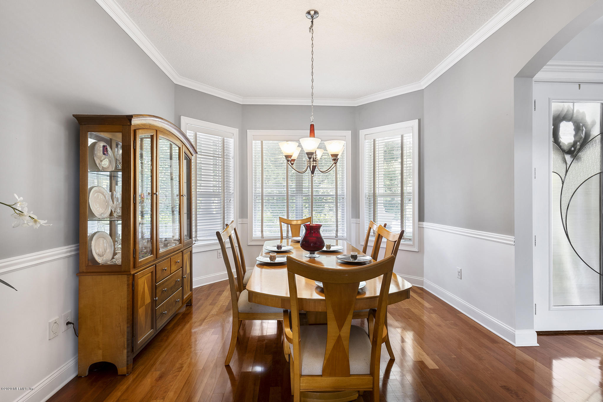 3255 Manatee Point Middleburg, FL 32068 - Photo 12 of 70 a view of a dining room with furniture window and wooden floor