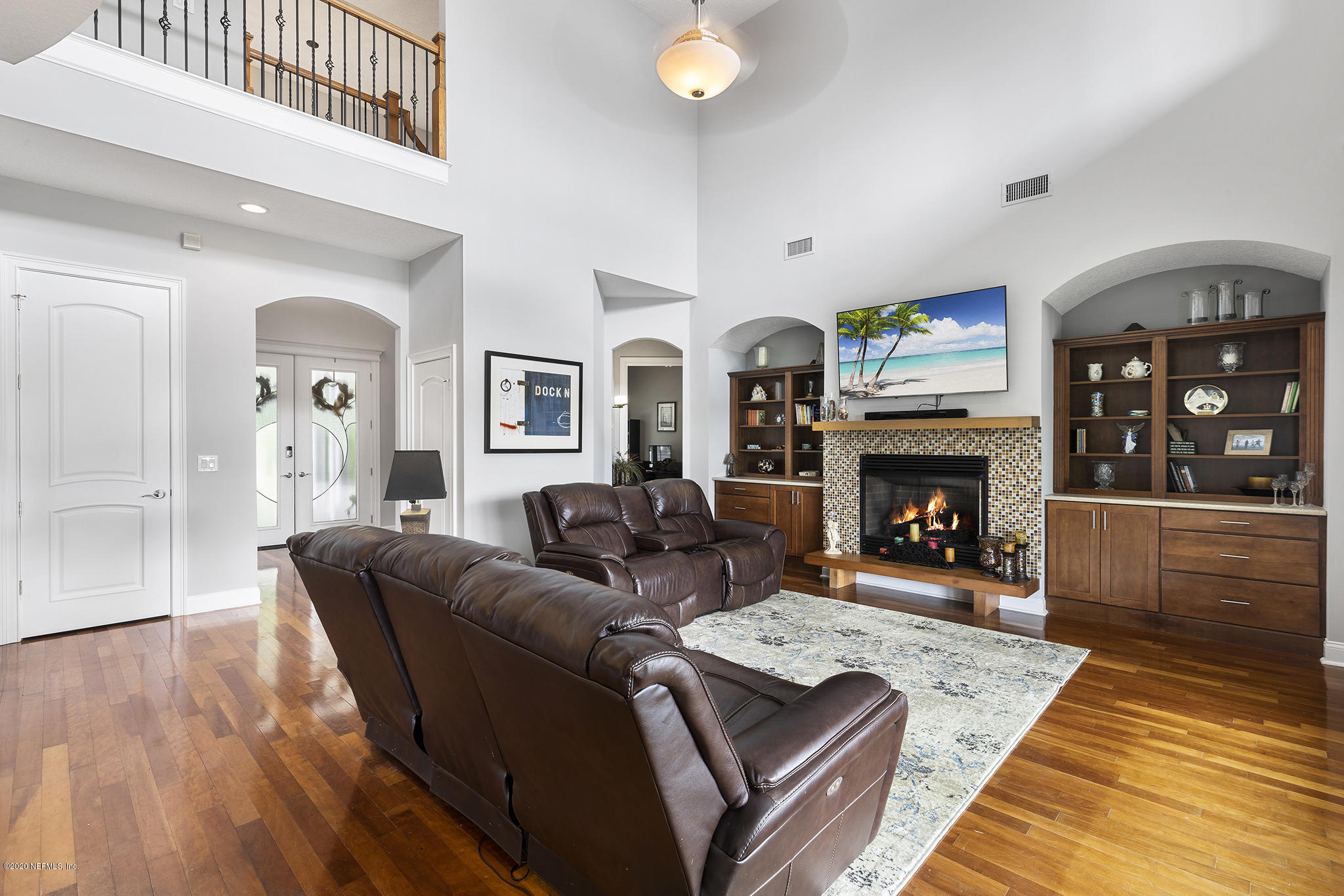 3255 Manatee Point Middleburg, FL 32068 - Photo 13 of 70 a living room with furniture and a fireplace