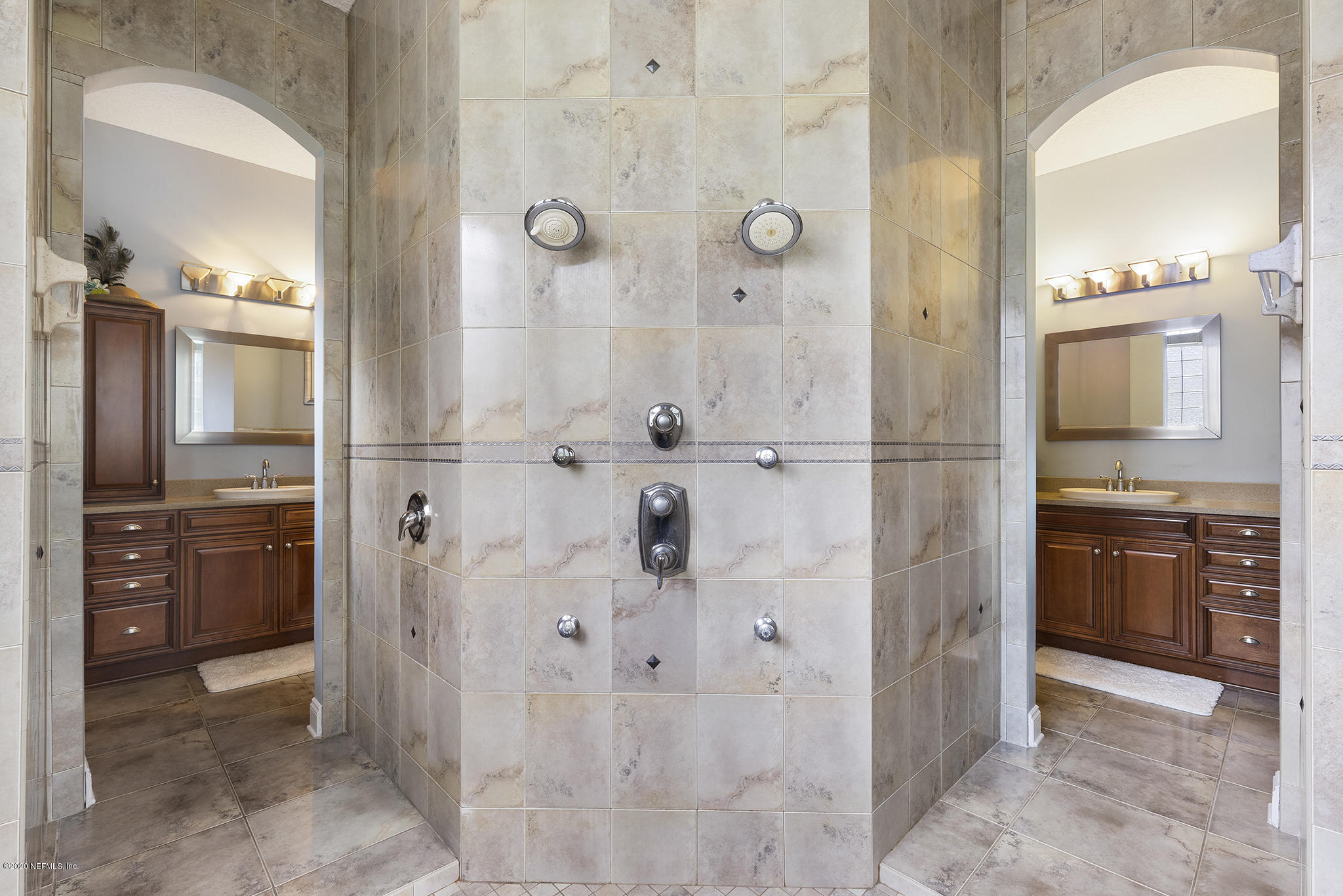 3255 Manatee Point Middleburg, FL 32068 - Photo 28 of 70 a bathroom with a granite countertop sink mirror and stainless steel appliances