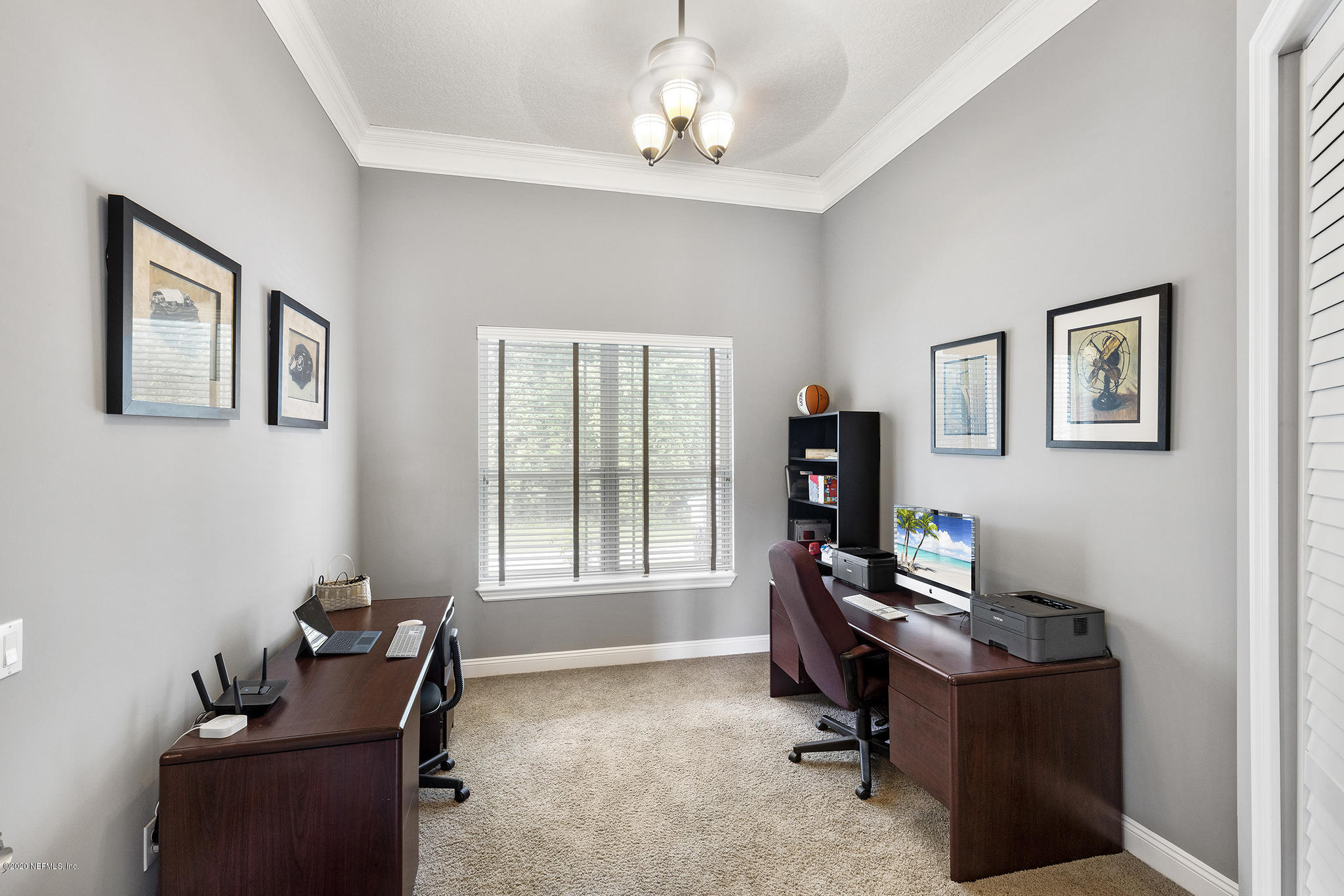 3255 Manatee Point Middleburg, FL 32068 - Photo 32 of 70 a view of a workspace with furniture and a window
