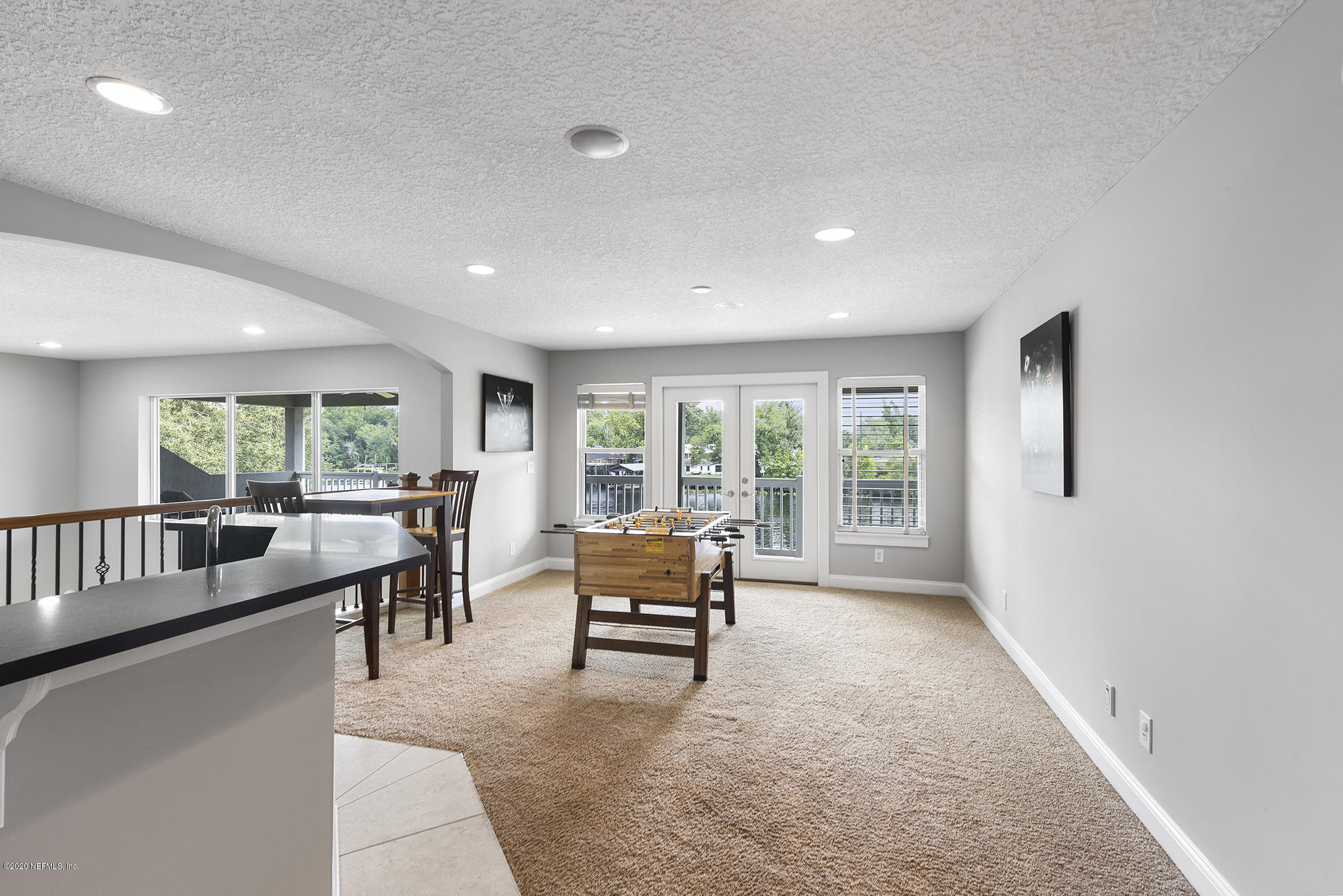 3255 Manatee Point Middleburg, FL 32068 - Photo 37 of 70 a living room with furniture and a large window
