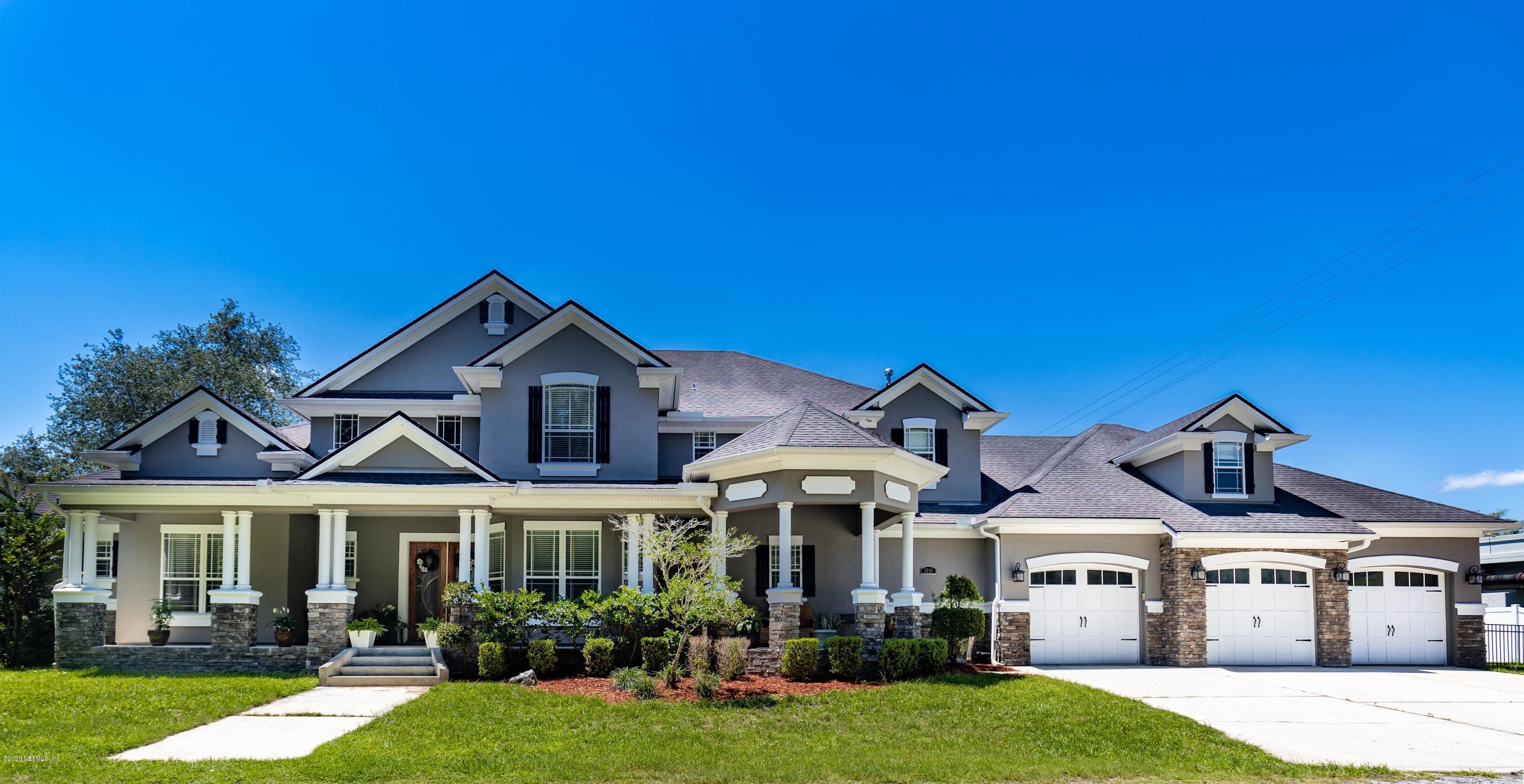 3255 Manatee Point Middleburg, FL 32068 - Photo 62 of 70 a front view of a house with garden