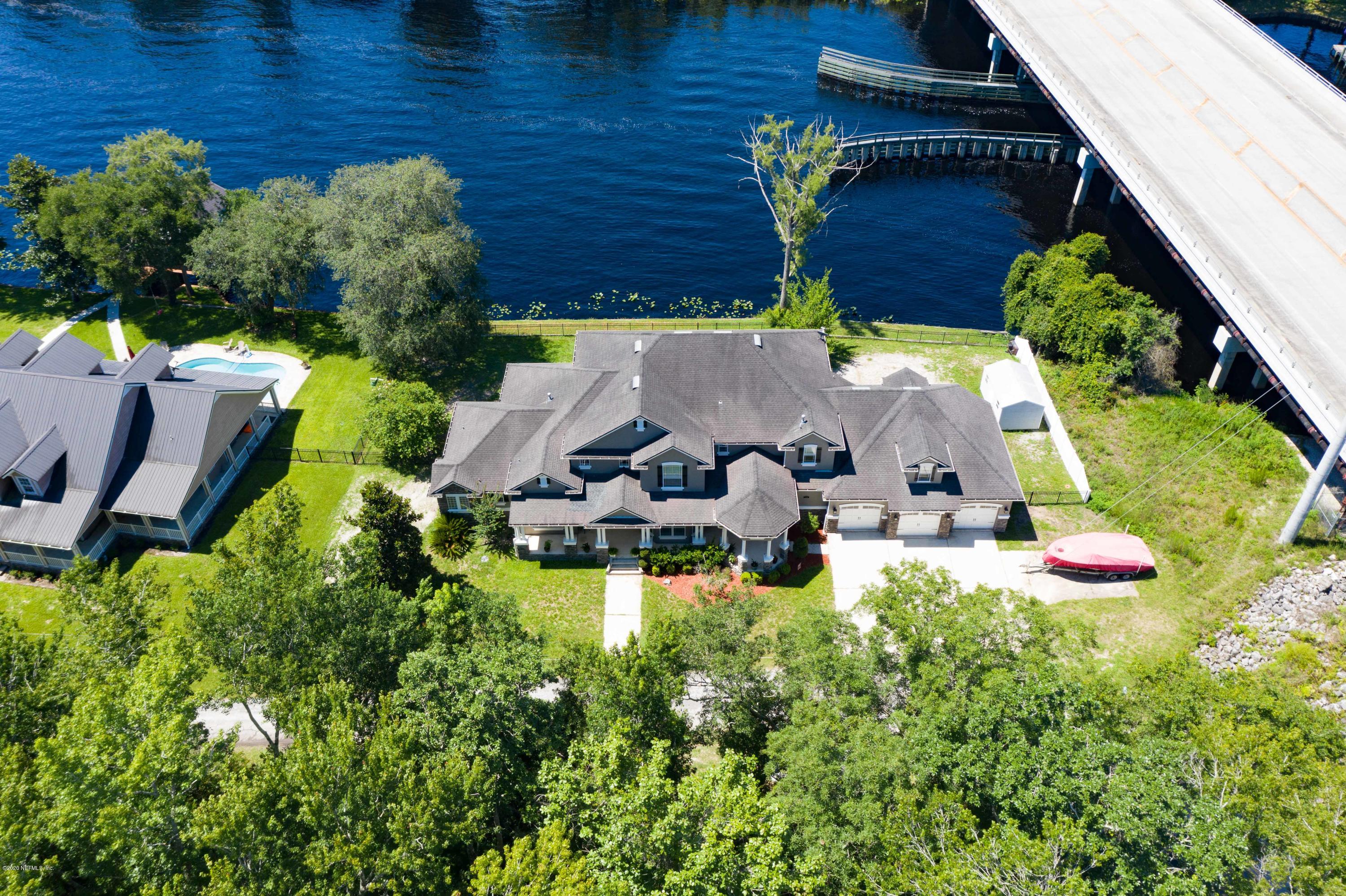 3255 Manatee Point Middleburg, FL 32068 - Photo 70 of 70 an aerial view of a house with garden space sitting space