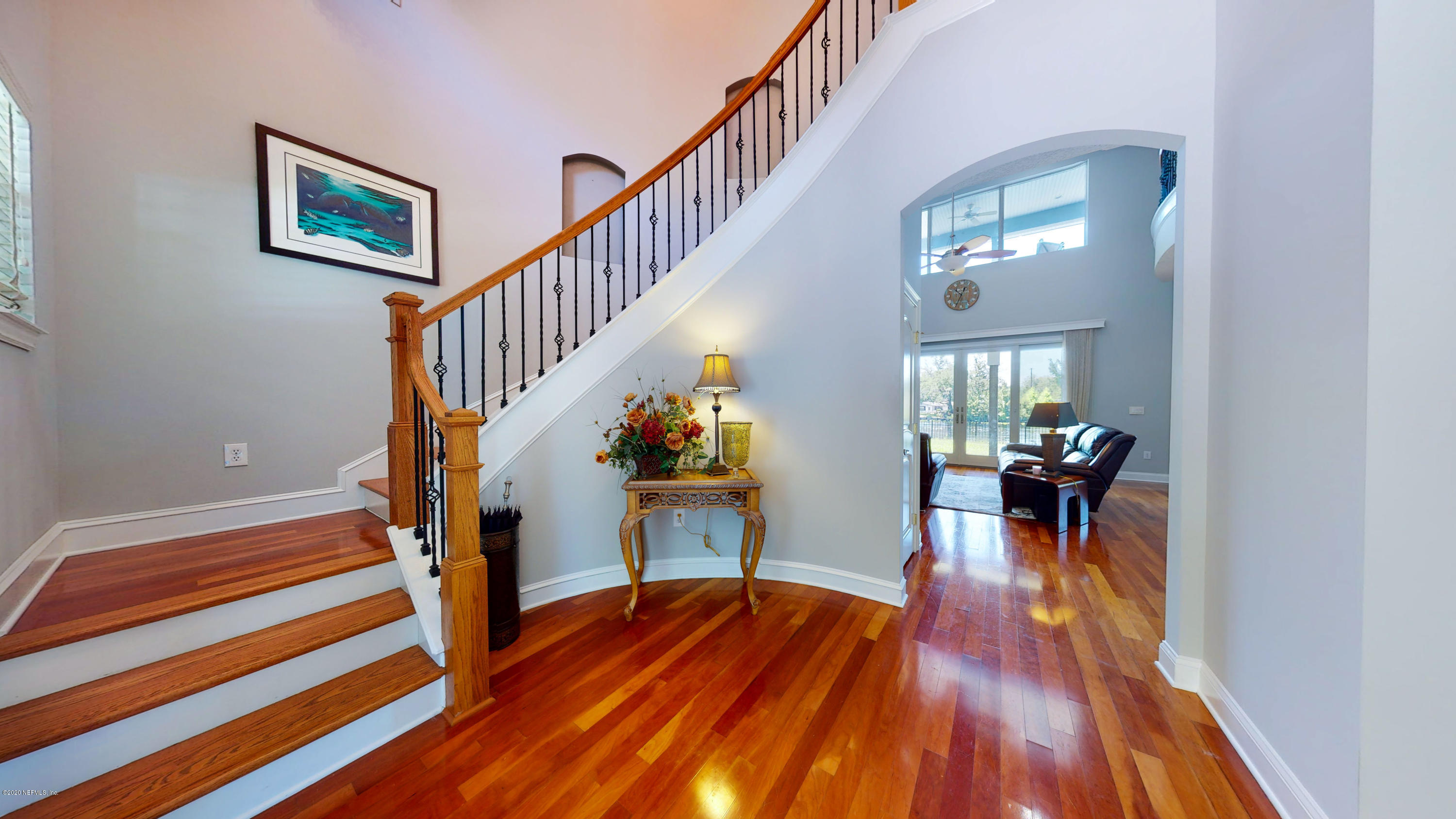 3255 Manatee Point Middleburg, FL 32068 - Photo 7 of 70 a view of entryway livingroom and hall with wooden floor