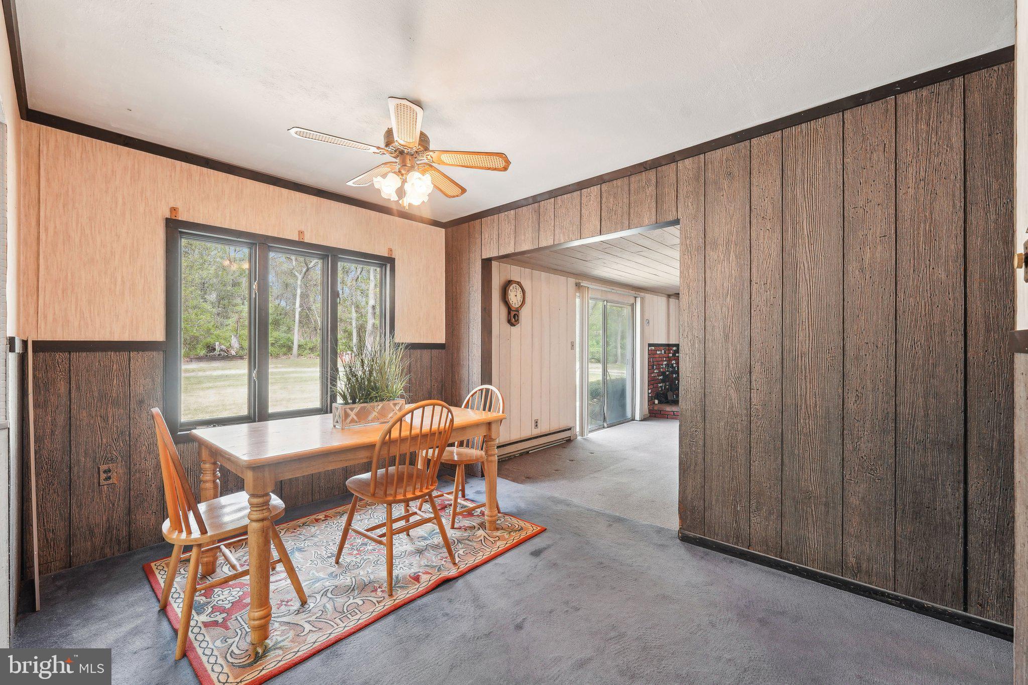 2 Oakview Drive Berlin, NJ 08009 - Photo 11 of 64 a dining room with furniture a chandelier and wooden floor