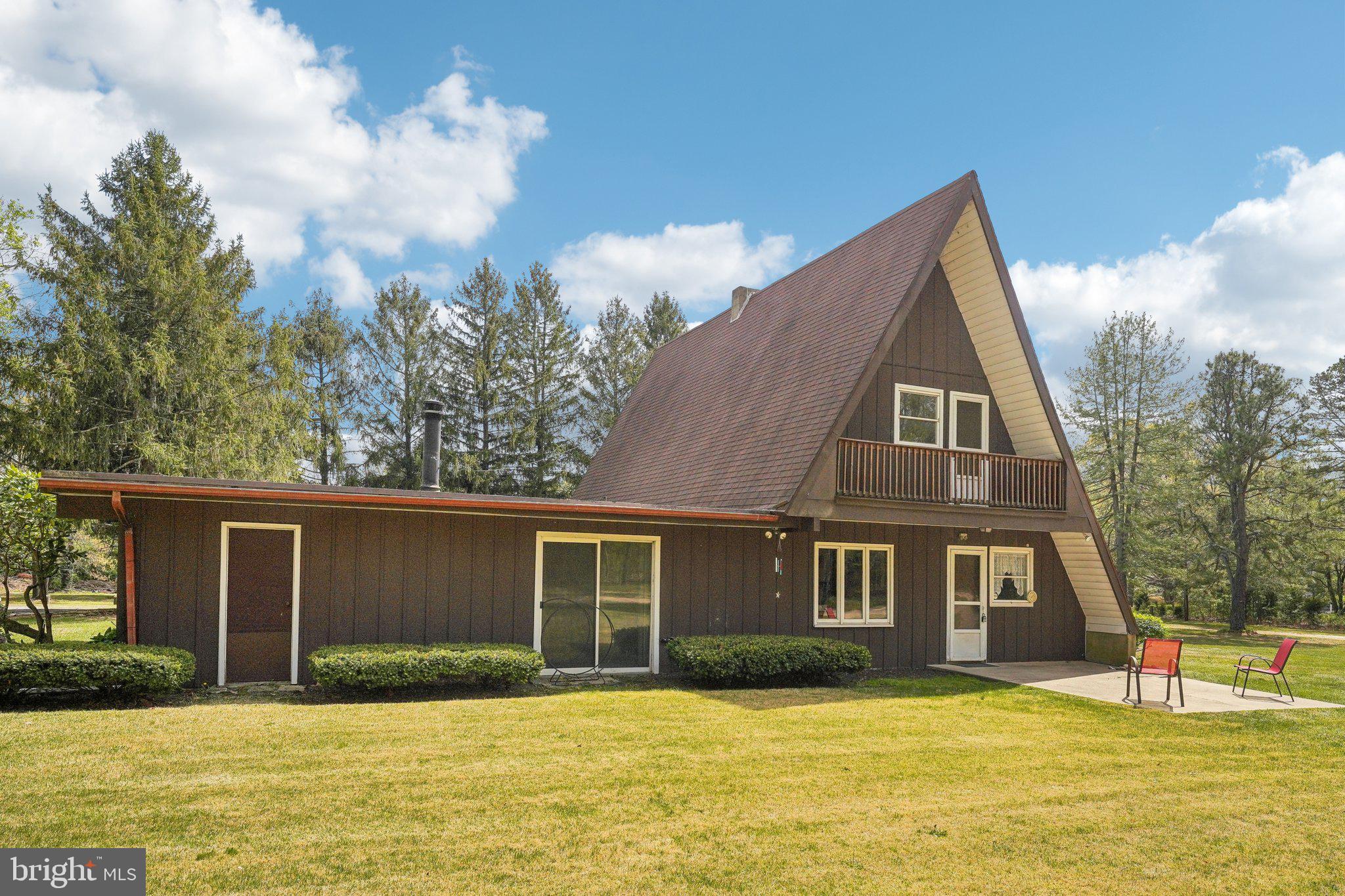 2 Oakview Drive Berlin, NJ 08009 - Photo 2 of 64 a front view of a house with a yard