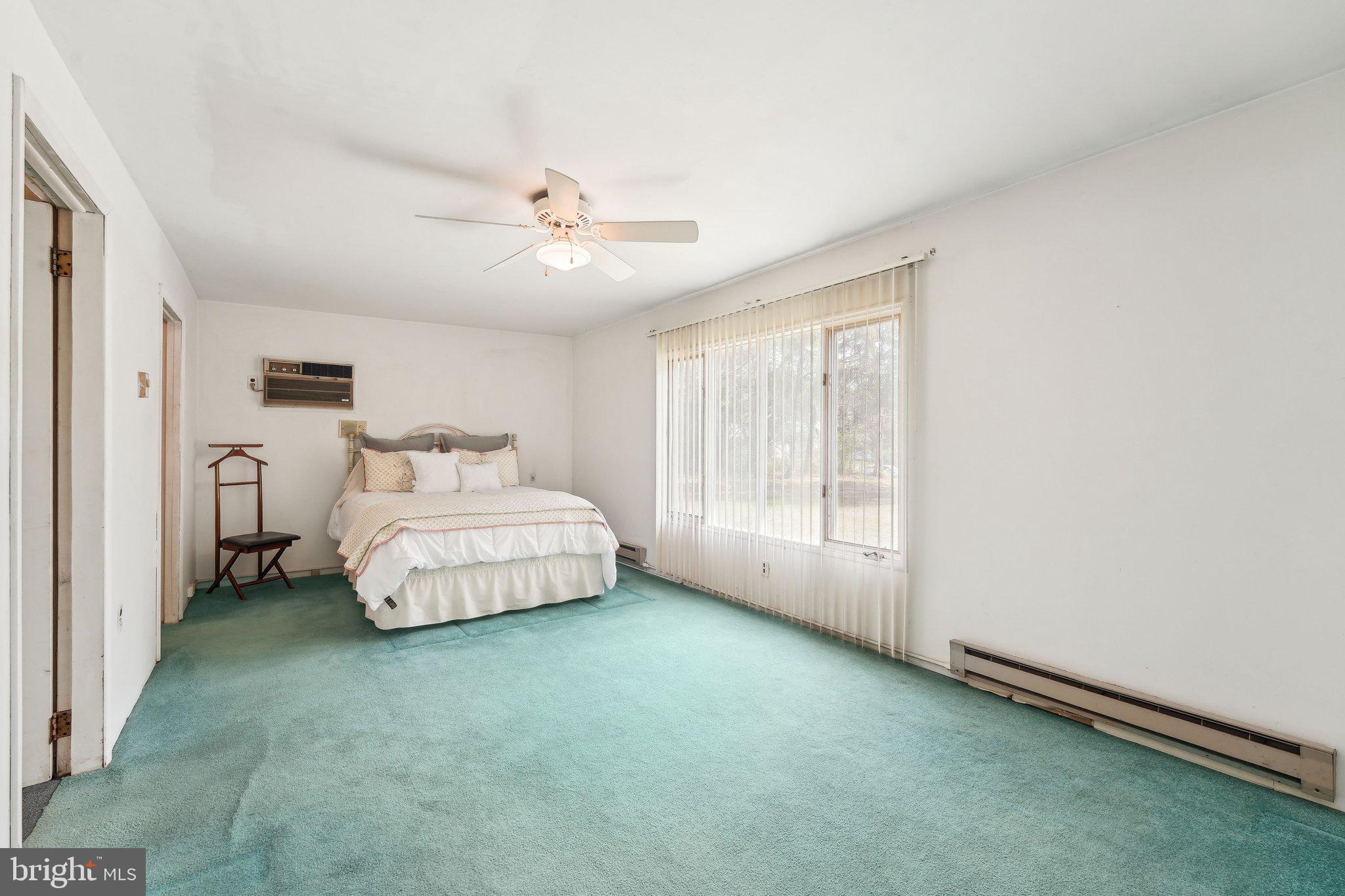 2 Oakview Drive Berlin, NJ 08009 - Photo 21 of 64 a spacious bedroom with a bed and window