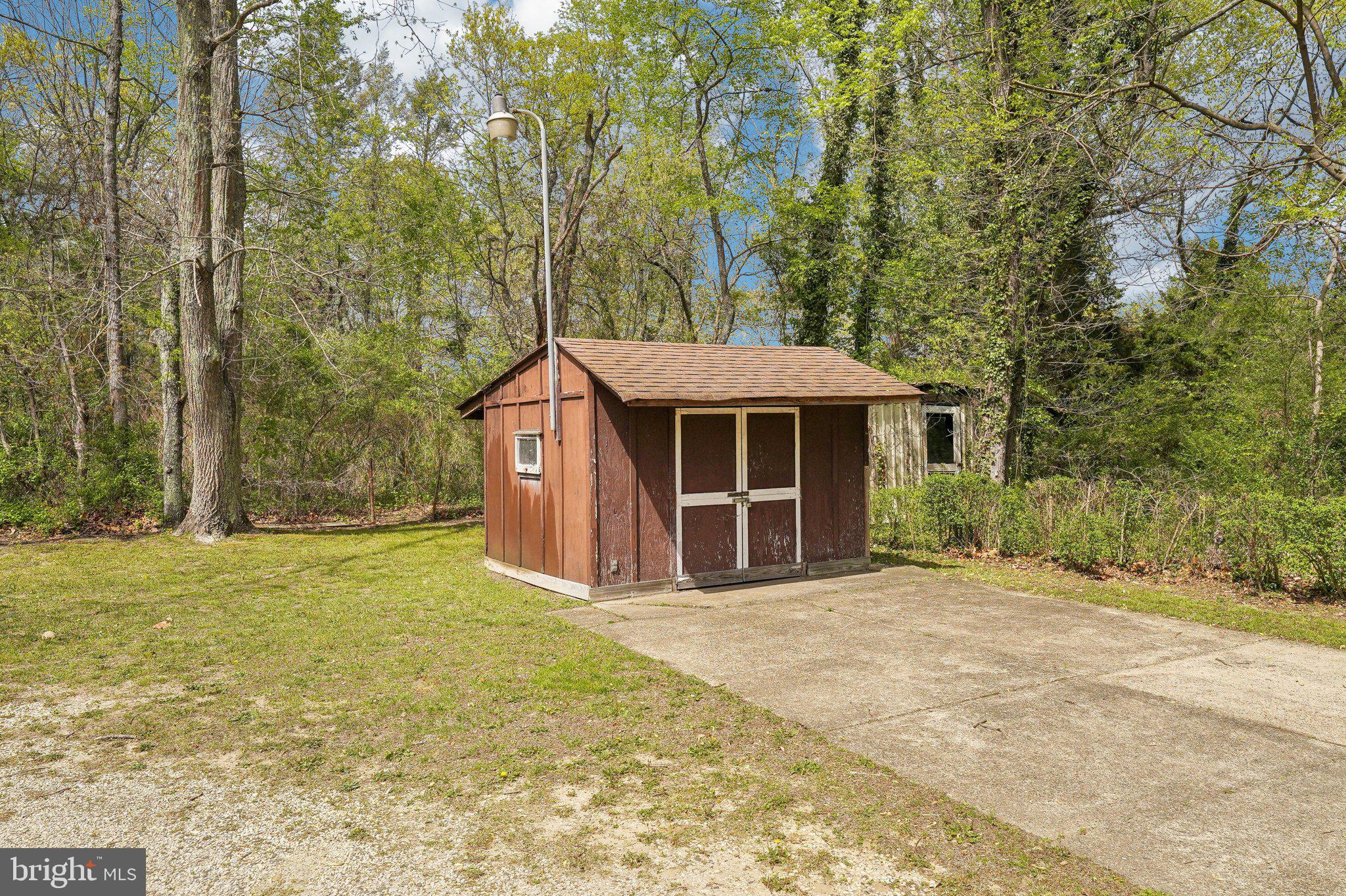 2 Oakview Drive Berlin, NJ 08009 - Photo 39 of 64 a view of a house with backyard and trees