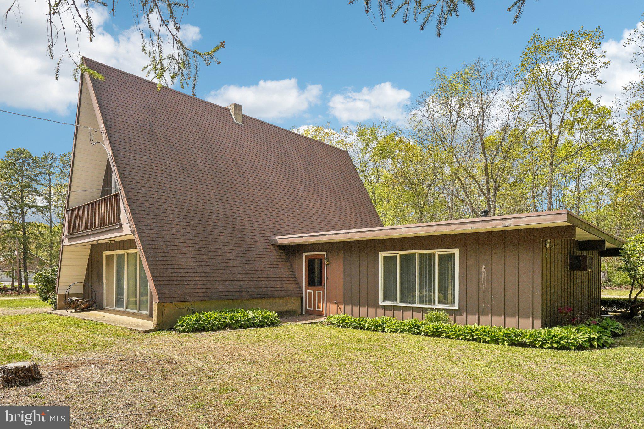 2 Oakview Drive Berlin, NJ 08009 - Photo 40 of 64 a front view of a house with a garden