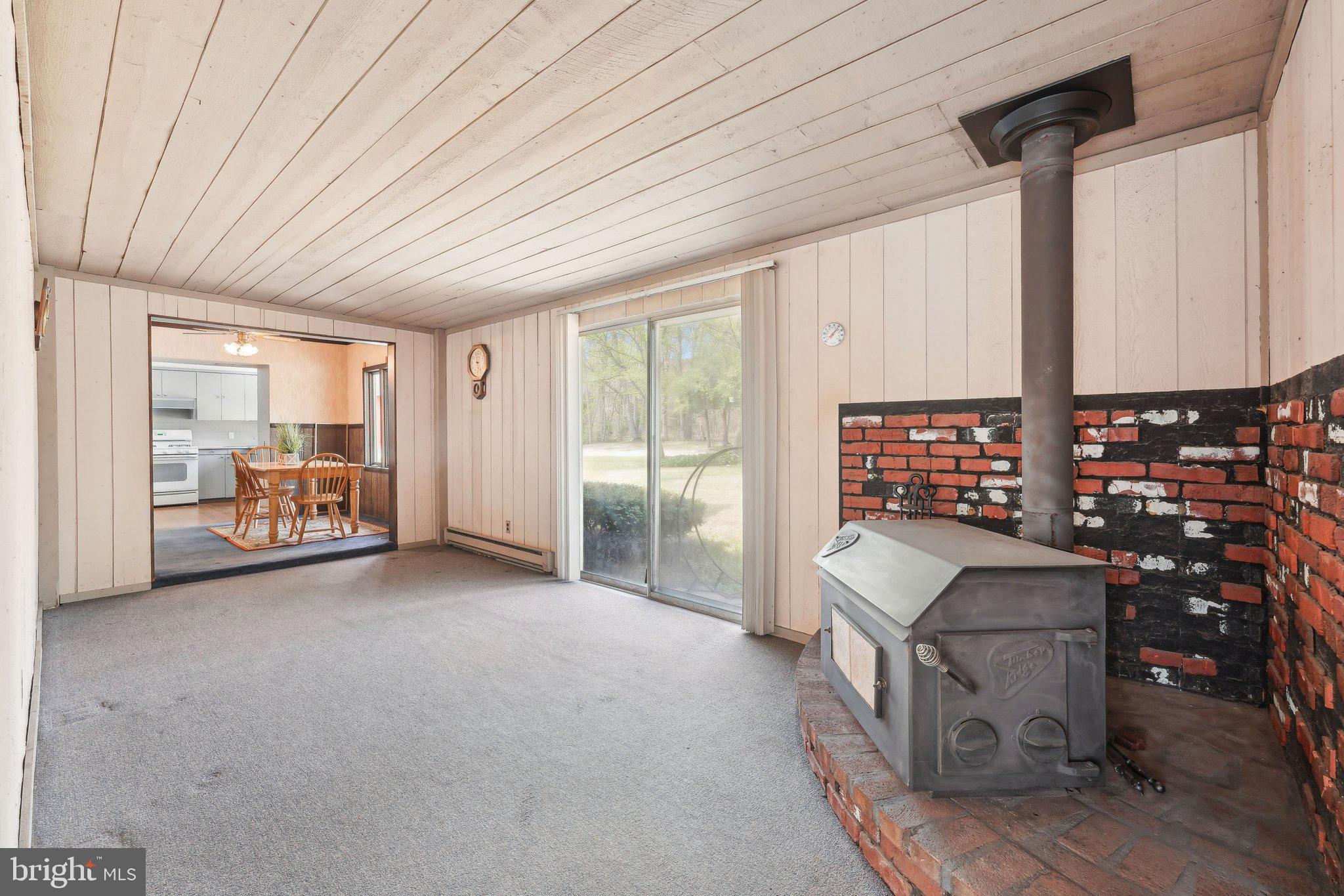 2 Oakview Drive Berlin, NJ 08009 - Photo 9 of 64 a view of livingroom with furniture and floor to ceiling window