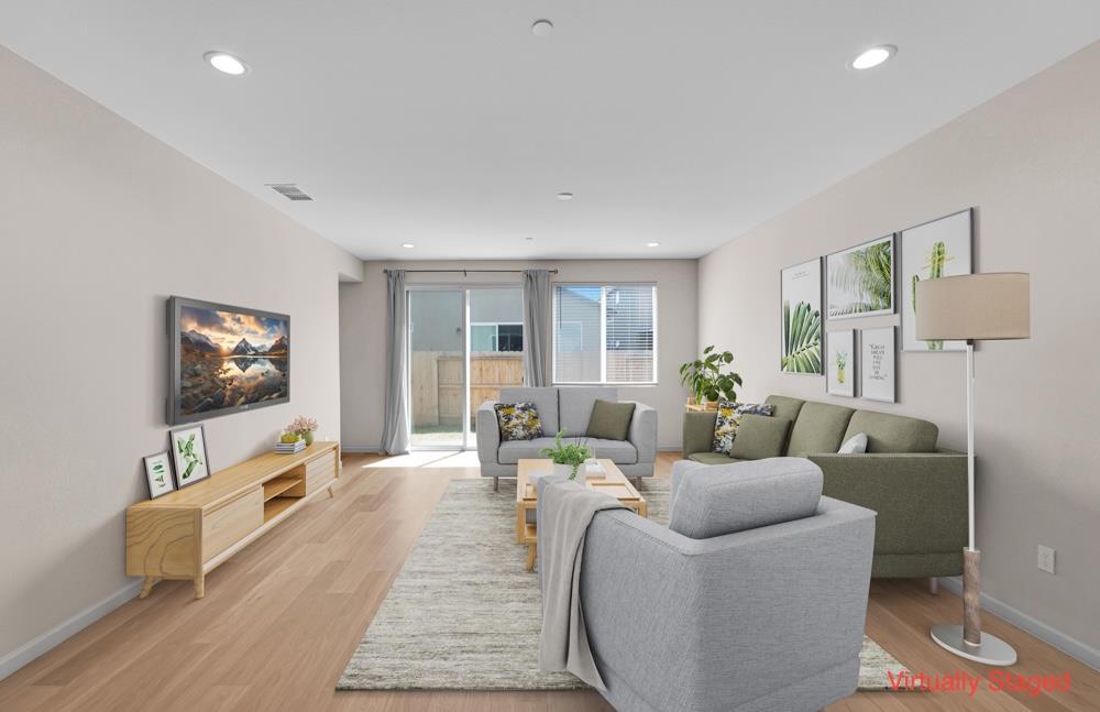 542 Legado Drive Soledad, CA 93960 - Photo 9 of 28 a living room with furniture and a flat screen tv