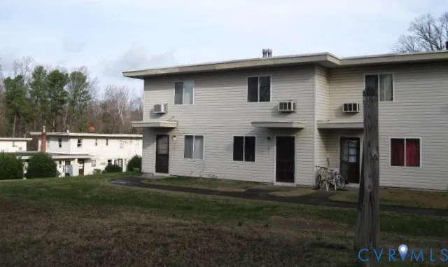 a house view with a garden space
