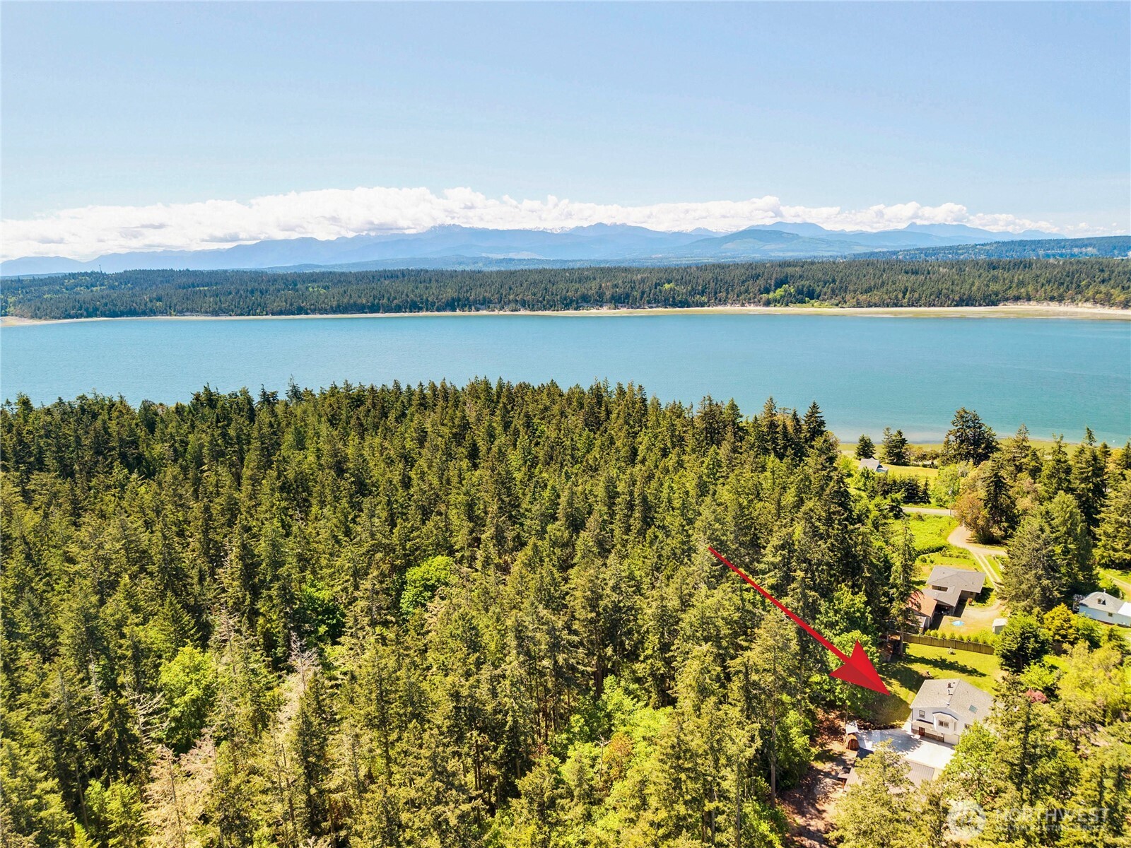 196 Nolton Road Nordland, WA 98358 - Photo 39 of 39 a view of a lake with houses in the back