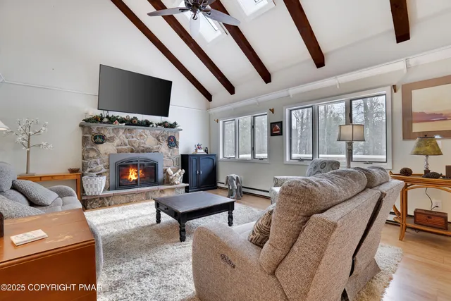 a bed room with a bed and a chandelier