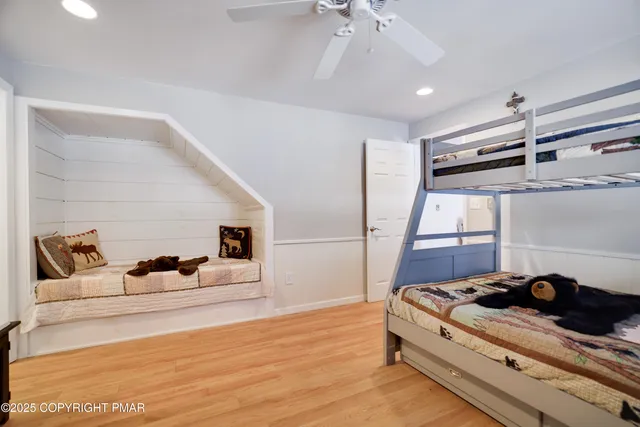 a bathroom with a sink a mirror and a window