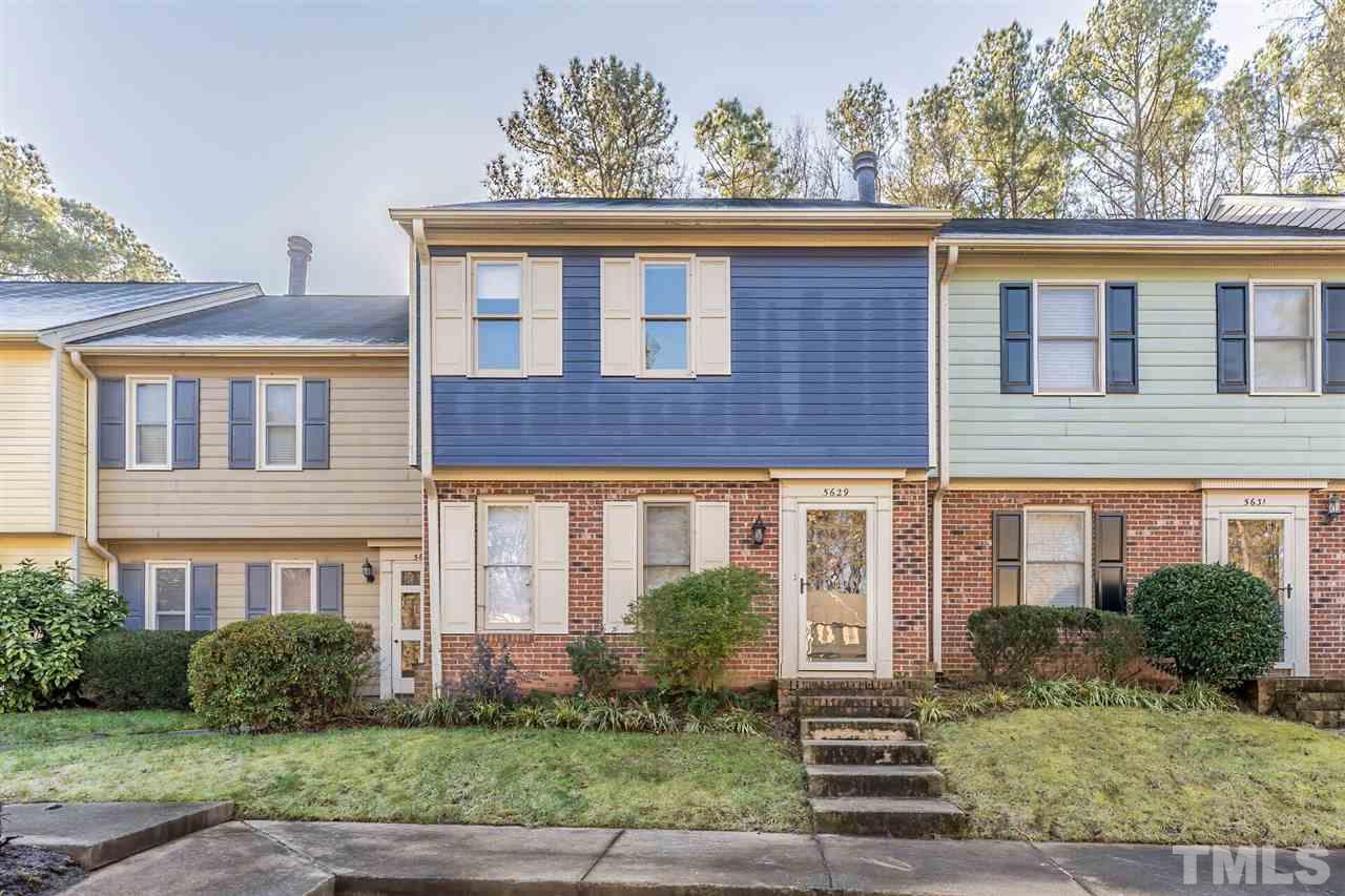5629 Hamstead Crossing Raleigh, NC 27612 - Photo 1 of 27 a front view of a house with garden