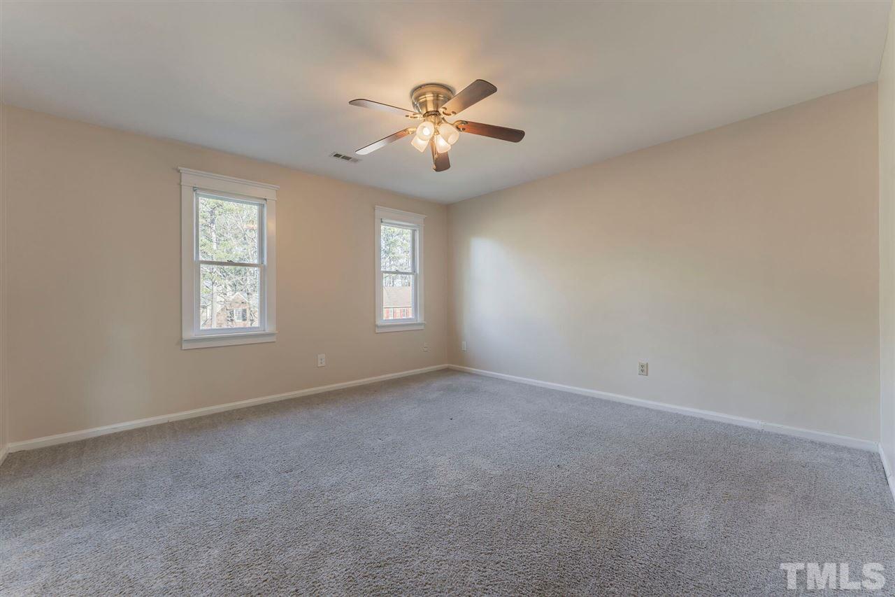 5629 Hamstead Crossing Raleigh, NC 27612 - Photo 13 of 27 a view of an empty room with a window