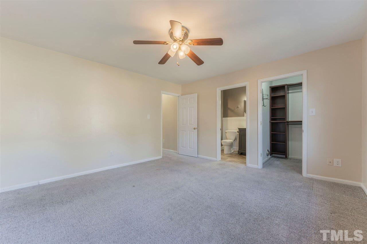 5629 Hamstead Crossing Raleigh, NC 27612 - Photo 14 of 27 a view of empty room with ceiling fan