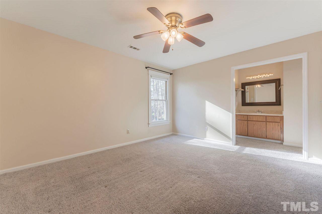 5629 Hamstead Crossing Raleigh, NC 27612 - Photo 19 of 27 a view of an empty room with a window