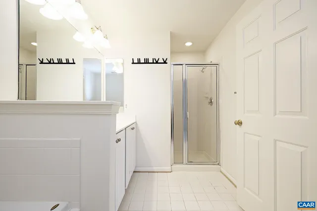 a view of a bathroom from the hallway