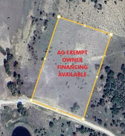 a view of a balcony with wooden floor
