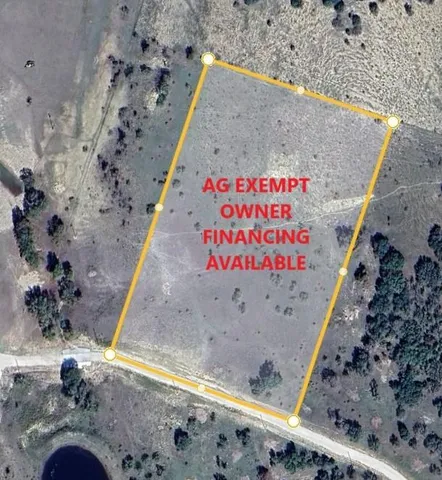 a view of a balcony with wooden floor