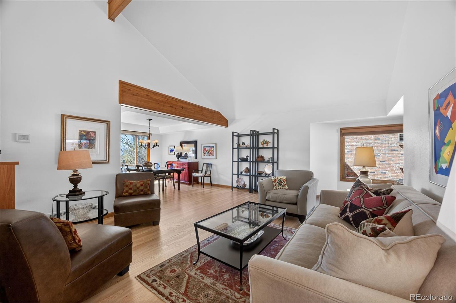 2452 Terraridge Drive Highlands Ranch, CO 80126 - Photo 13 of 50 a living room with furniture and a wooden floor
