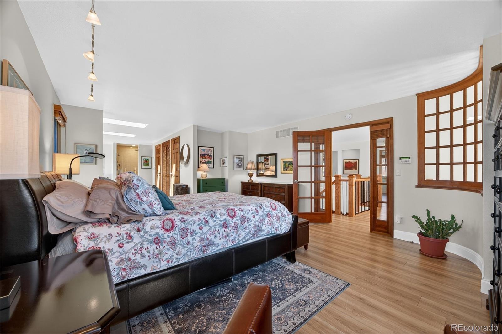 2452 Terraridge Drive Highlands Ranch, CO 80126 - Photo 20 of 50 a bedroom with a large bed and a window