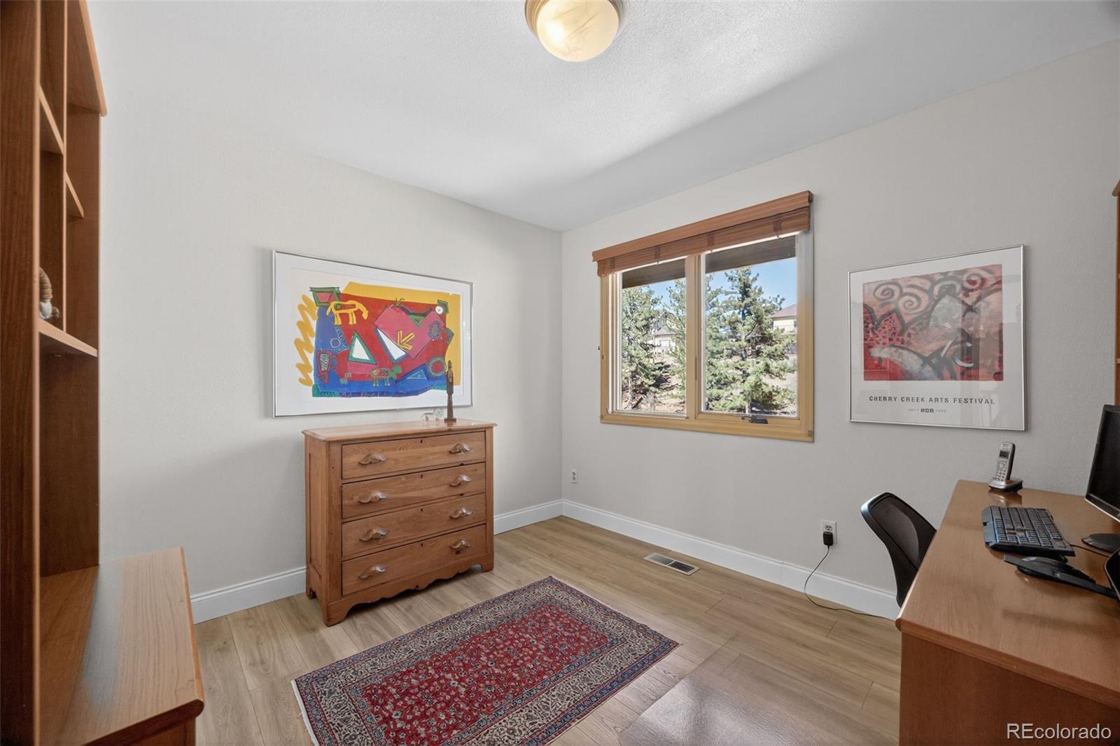 2452 Terraridge Drive Highlands Ranch, CO 80126 - Photo 26 of 50 a workspace with furniture and window
