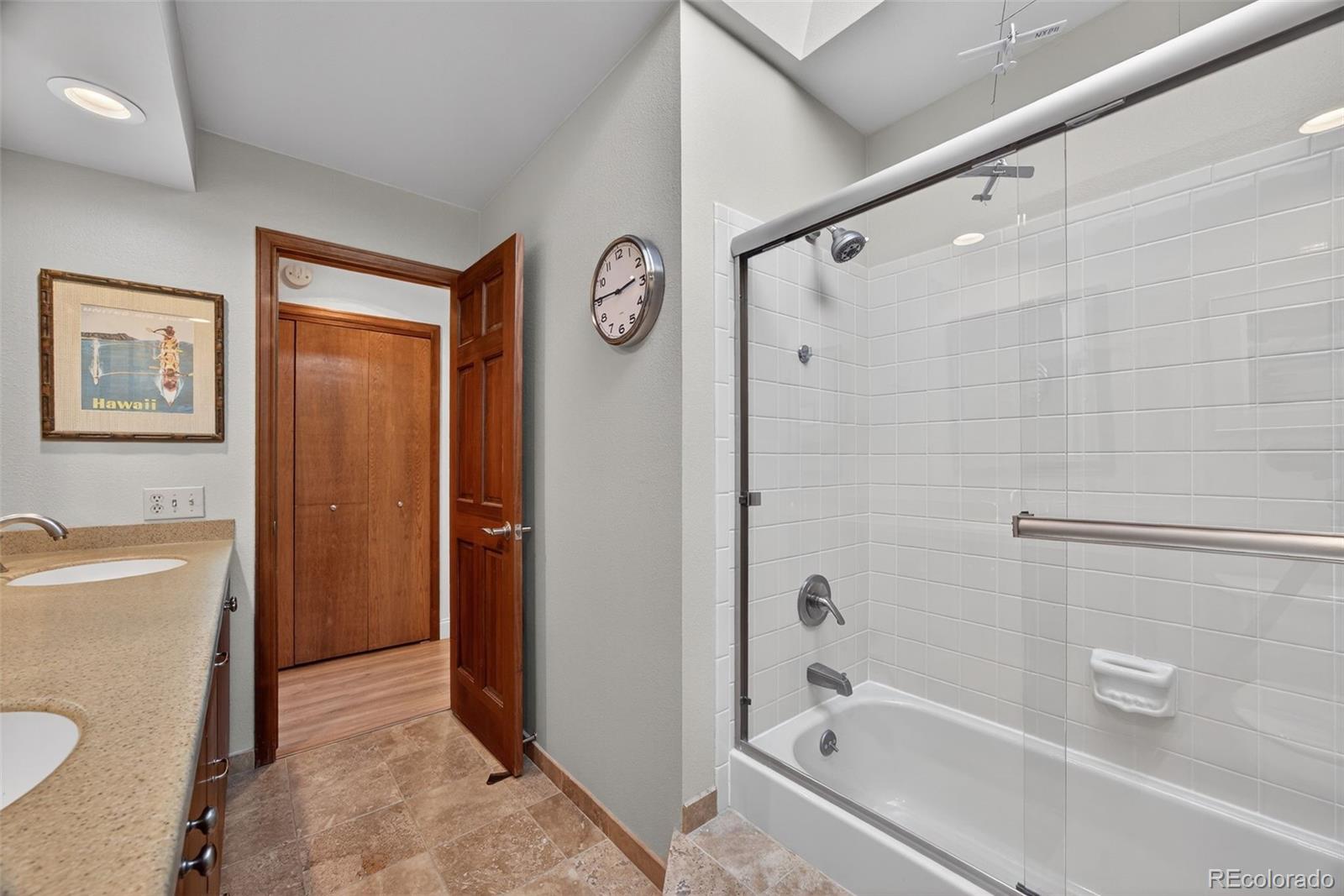 2452 Terraridge Drive Highlands Ranch, CO 80126 - Photo 28 of 50 a bathroom with a bathtub and a shower