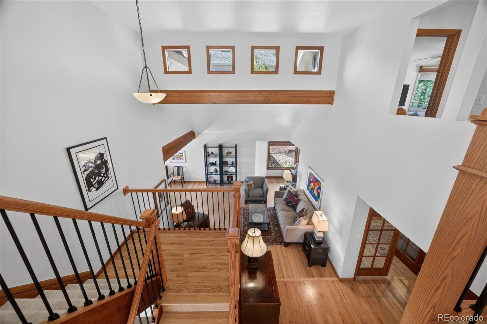2452 Terraridge Drive Highlands Ranch, CO 80126 - Photo 32 of 50 a view of a livingroom with furniture and hardwood floor