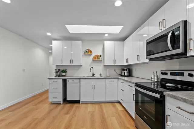 a dining room with table and chairs