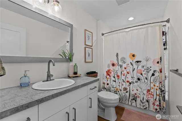 a view of a house with a backyard porch and sitting area