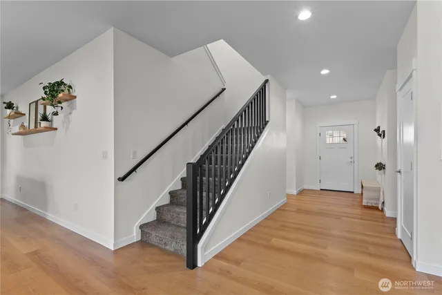 a view of a hallway with staircase