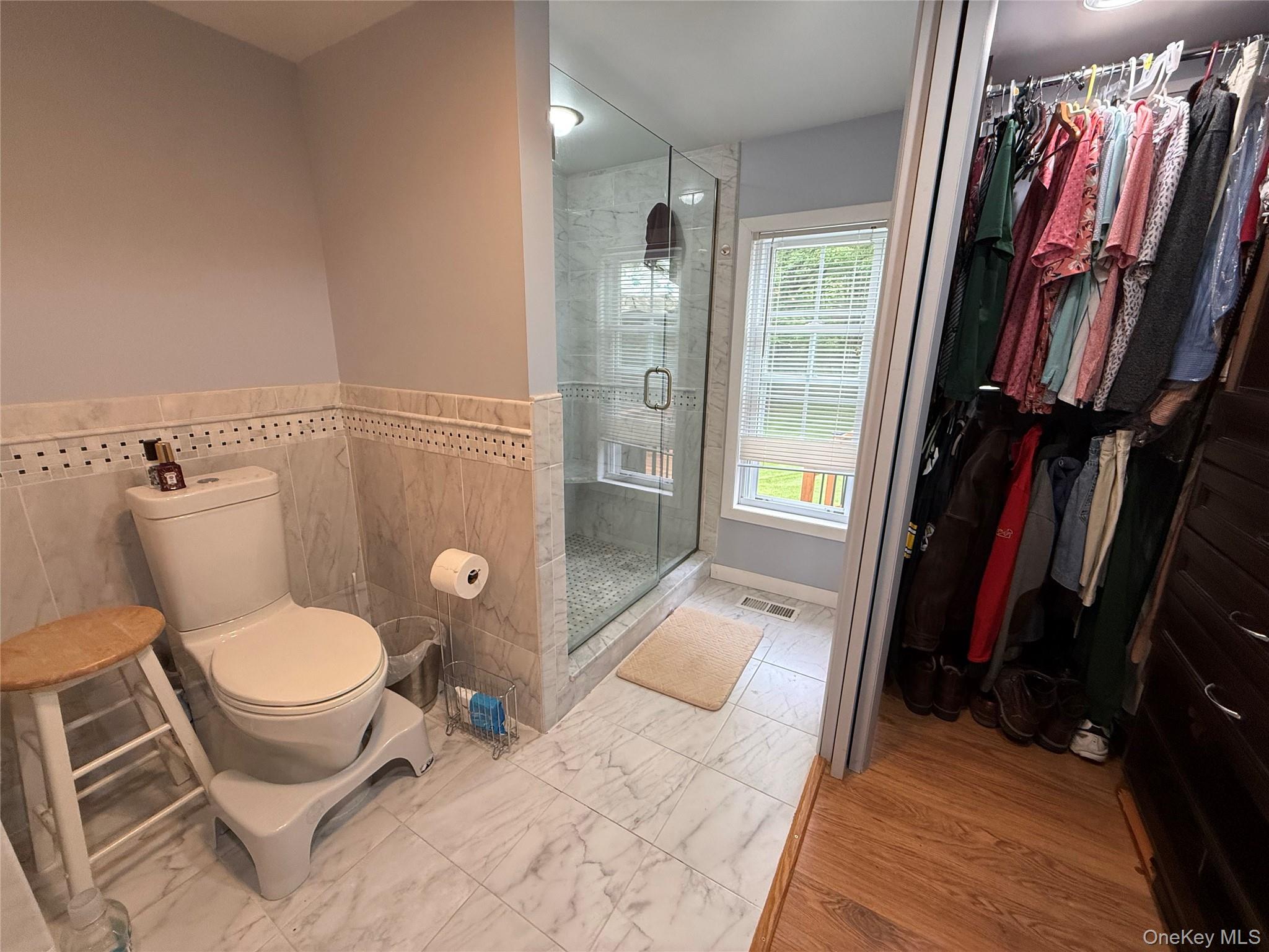 502 Myers Road Neversink, NY 12765 - Photo 21 of 38 a bathroom with a toilet and a shower