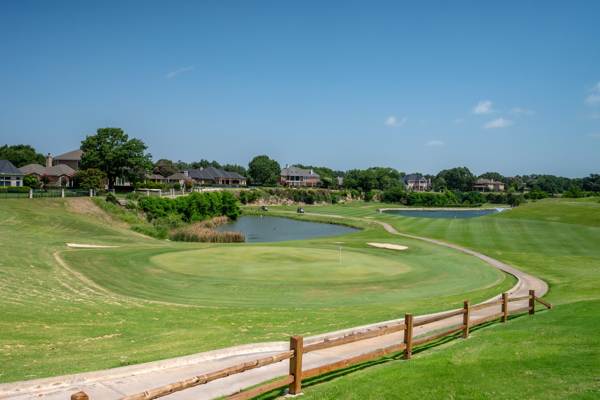 30115 Sawgrass Trail Georgetown, TX 78628 - Photo 32 of 37 Lush fairways and a serene pond define this exceptional golf course property.