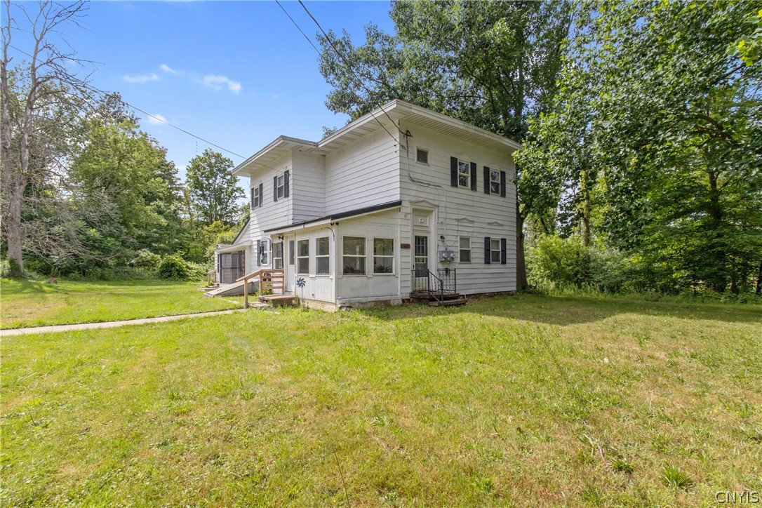 47 Thompson Road Oswego, NY 13126 - Photo 4 of 47 On nearly 2 acres of land that backs up to State owned land.