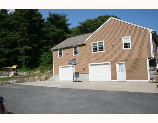 12 Grove Road Cumberland, RI 02864 - Photo 3 of 9 Exterior Front. Side view of 2005 addition