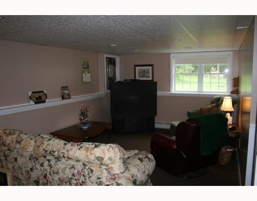 12 Grove Road Cumberland, RI 02864 - Photo 7 of 9 Den/Family/Great Room. Lower level family room