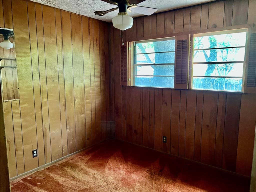 200 Dallas Street Nocona, TX 76255 - Photo 16 of 29 a view of an empty room with a window