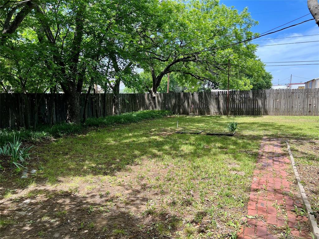 200 Dallas Street Nocona, TX 76255 - Photo 25 of 29 a view of a backyard