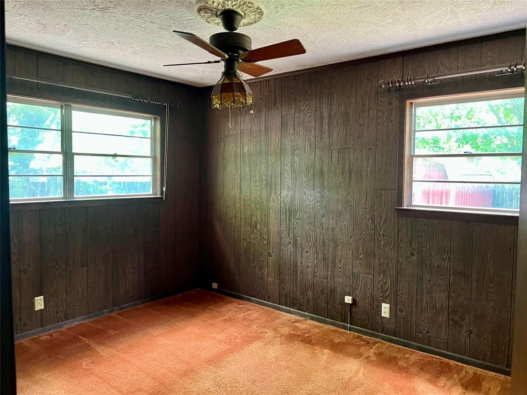 200 Dallas Street Nocona, TX 76255 - Photo 9 of 29 a view of an empty room with a window