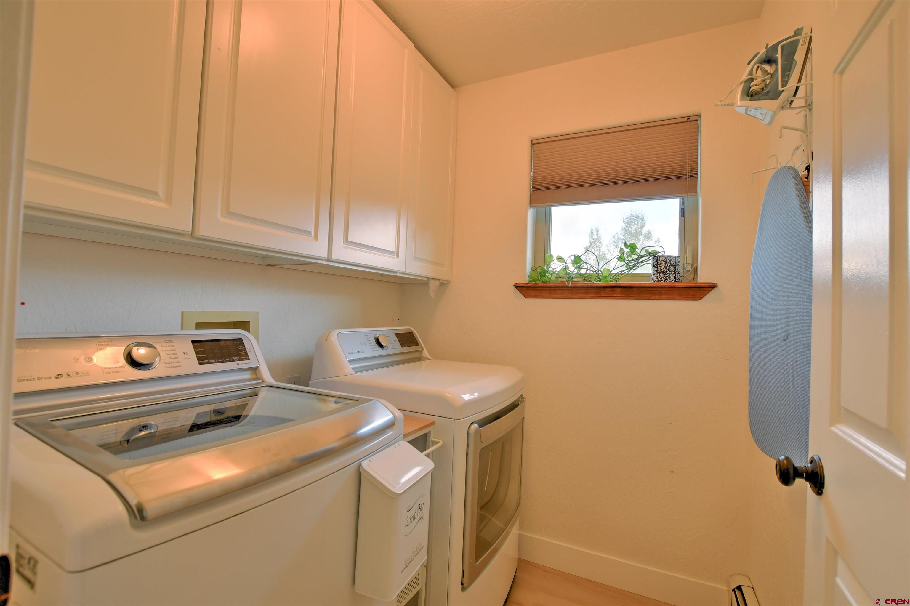 602 Chipeta Drive Ridgway, CO 81432 - Photo 30 of 41 a utility room with dryer and washer