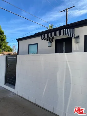 a front view of a house with a garage